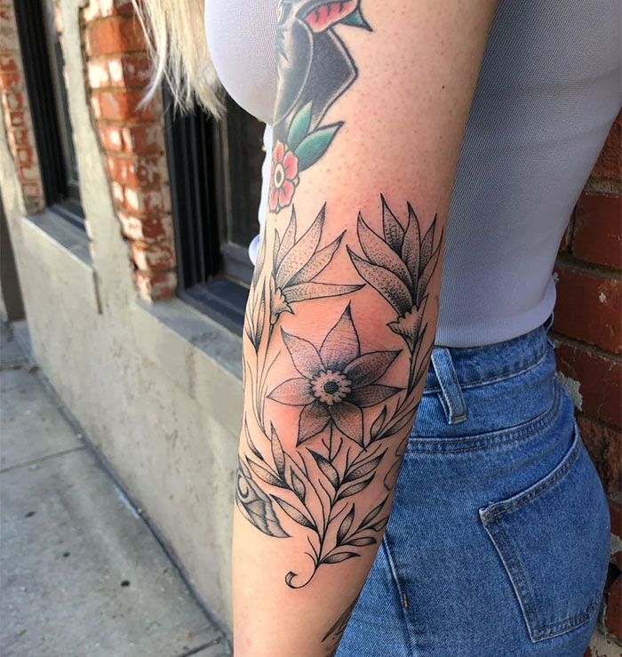 Flower tattoo on the elbow