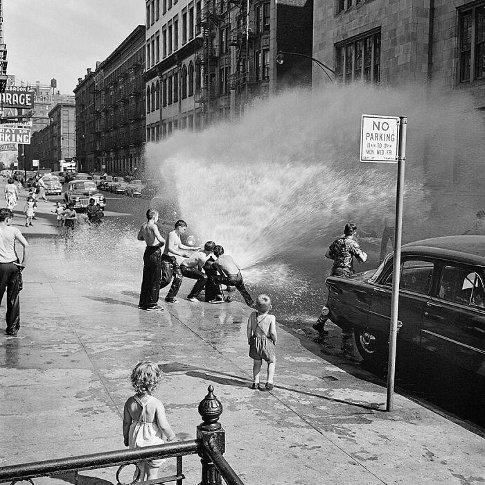 Children Enjoying The Water In The Streets In New York City, 1954