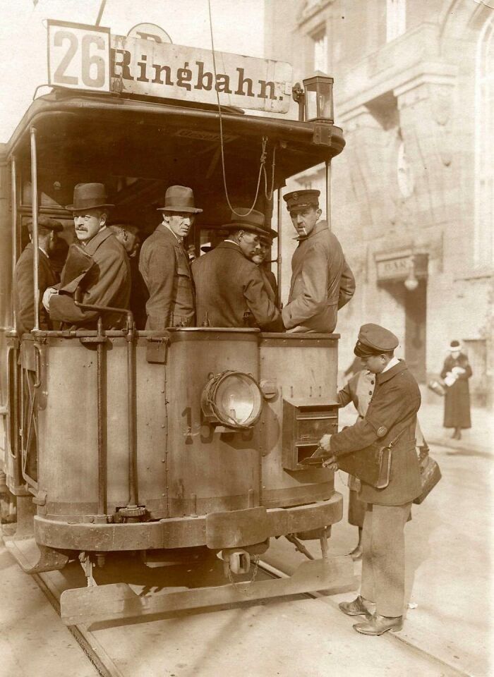 Postman Empties Mailbox Attached To A German Tram, Berlin, 1920
