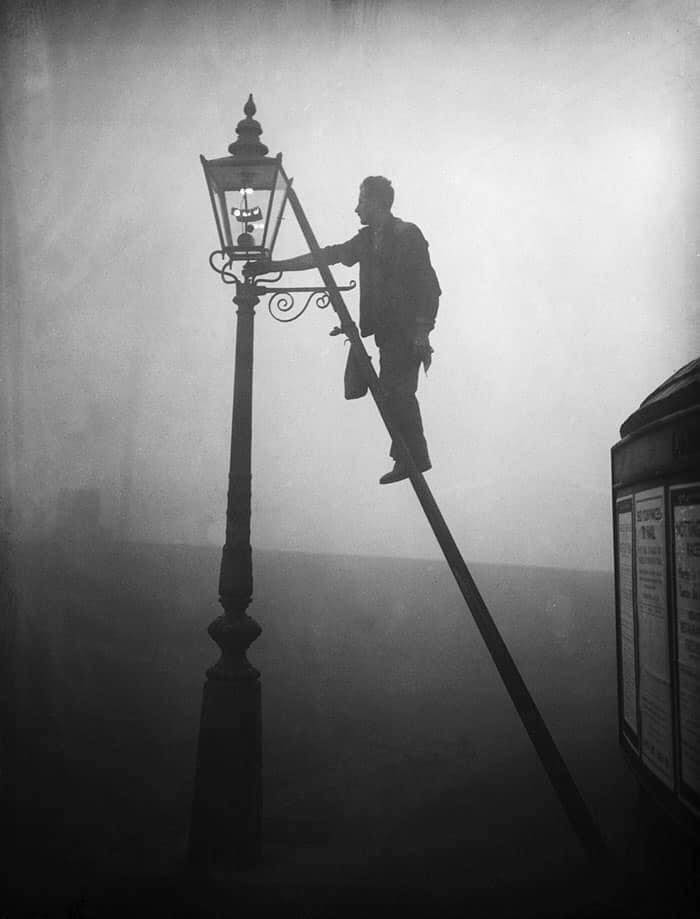 A Lamp Lighter At Work In London, 1935
