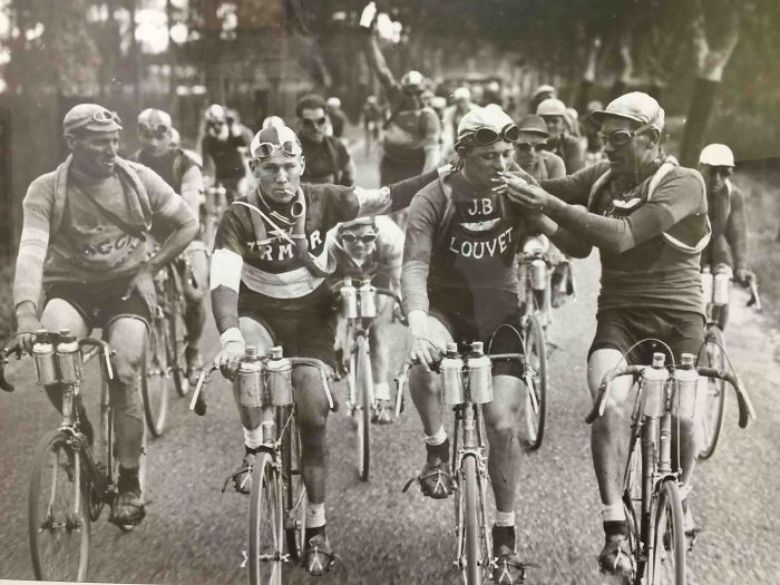 Cyclists At Tour De France In The 1920s Smoking Cigarettes. It Was Thought Cigarette Smoking Expanded The Lungs And Helped With Endurance