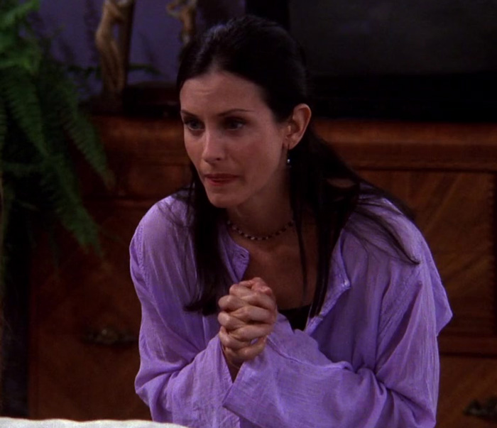 Monica wearing violet oversized shirt 