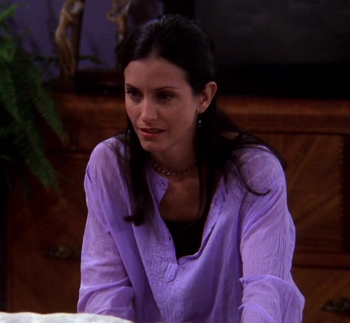 Monica wering violet shirt 