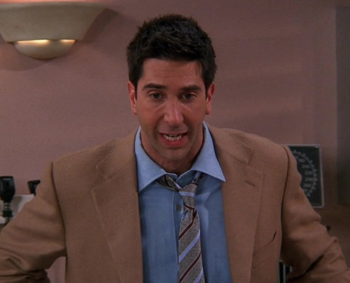 Ross wearing brown suite 