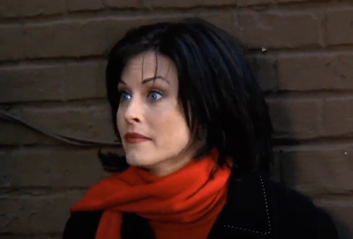 Monica wearing red scarf 