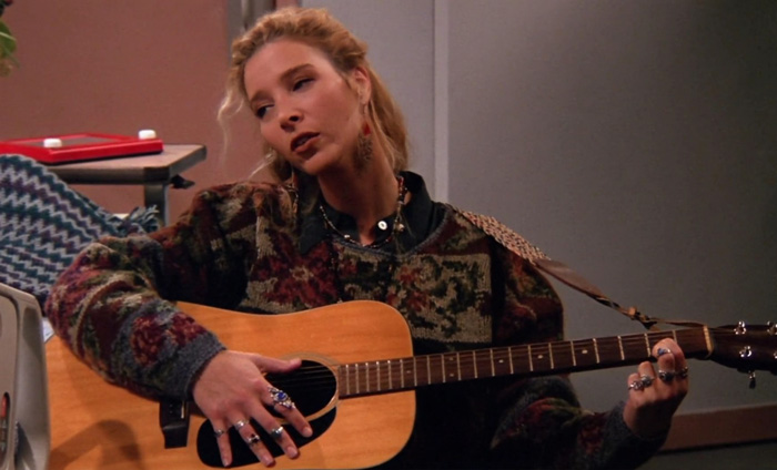 Phoebe playing the guitar