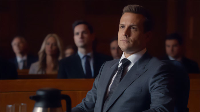 Harvey Specter looking thoughtful