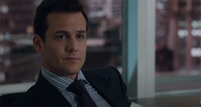 Harvey Specter looking thoughtful