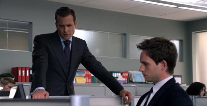 Harvey Specter looking thoughtful