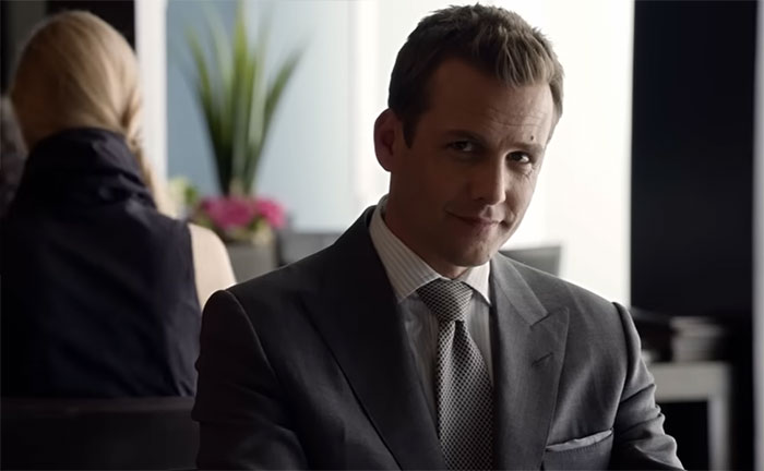 Harvey Specter smiling