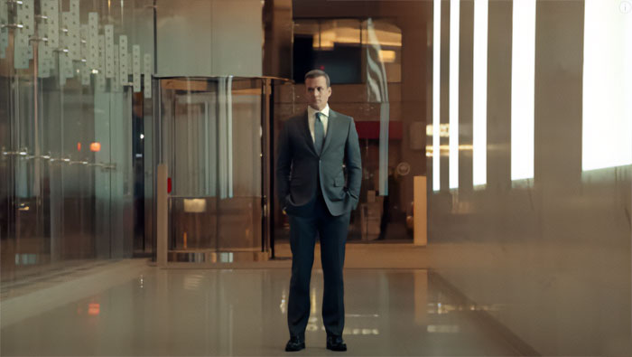 Harvey Specter standing in modern room