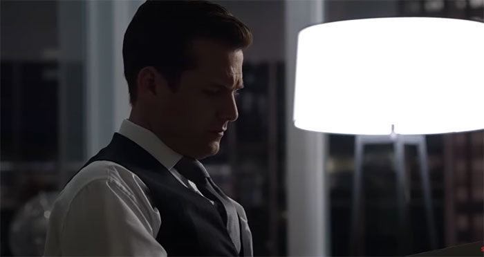 Harvey Specter looking down