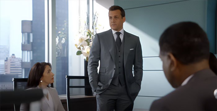 Harvey Specter standing in meeting room