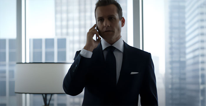 Harvey Specter talking on the phone