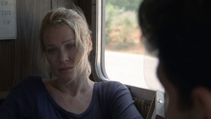 Andrea Harrison looking to other character 