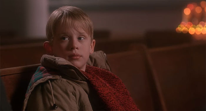 Kevin McCallister sitting and looking from Home Alone