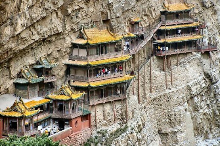 The Hanging Temple, Also Known As The Hanging Temple Of Hengshan, Is A Remarkable Architectural Marvel Located In Shanxi Province, China
