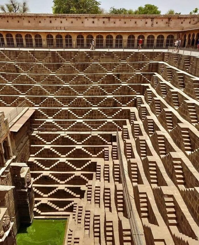 The Hidden Treasure Of Bharat! Built 1000+ Years Ago In The Abhaneri Village Of Rajasthan. India 64 Ft Deep, 13 Floors, And Has 3,500 Narrow Steps Arranged In Perfect Symmetry! The Chand Baori Is One Of The Largest Stepwells In The World And Also One Of The Most Beautiful Ones