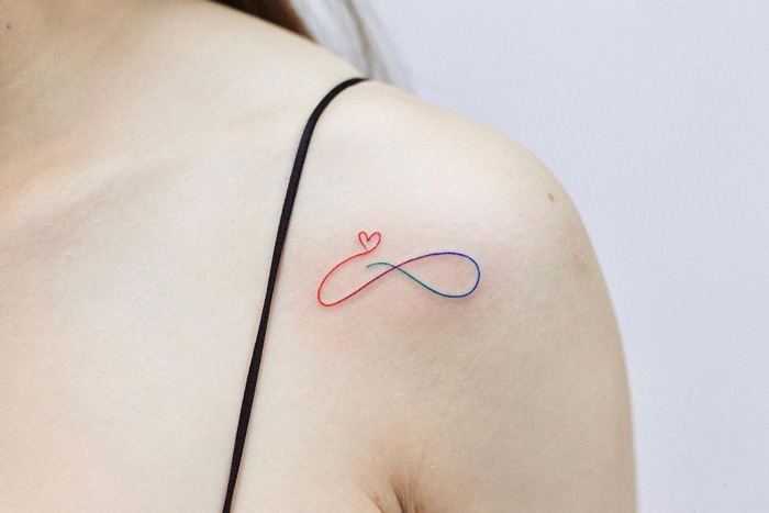 rainbow gradient infinity shoulder tattoo