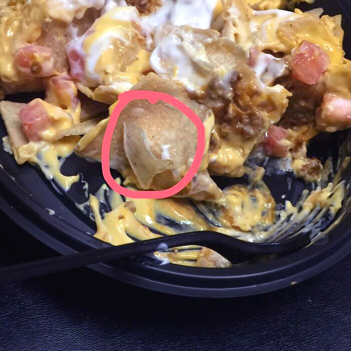 My Coworker Pulled This Giant Shard Of Glass Out Of Her Mouth From A Meal She Got At Taco Bell. About An Inch Big