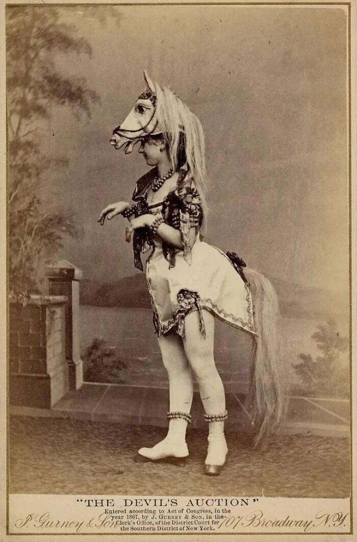 Burlesque Costumes In The 1800s Were A Bizarre Affair. This Is Eliza Blasina Wearing A Horse-Head Headdress. If You're Interested, I've Compiled A Gallery Of 10 Images Of Burlesque Performers From That Era