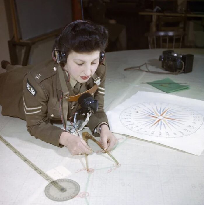 "A Member Of The Auxiliary Territorial Service, Miss Elizabeth Amery, Computes The Range At 428 Battery, Coastal Defence Artillery Headquarters, Dover, December 1942." Original Color Photograph