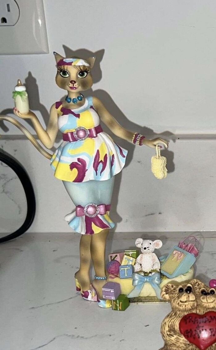 Just Won This At An Auction. It's So Weird!? Like Who Was This Made For? Why Is Cat Lady So Sexy? What's Up With The Baby Stuff!?!?