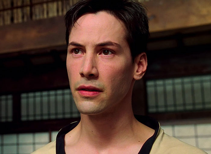 Keanu Reeves wearing brown kimono