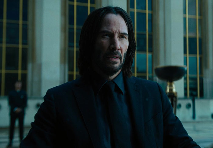 Keanu Reeves wearing suit