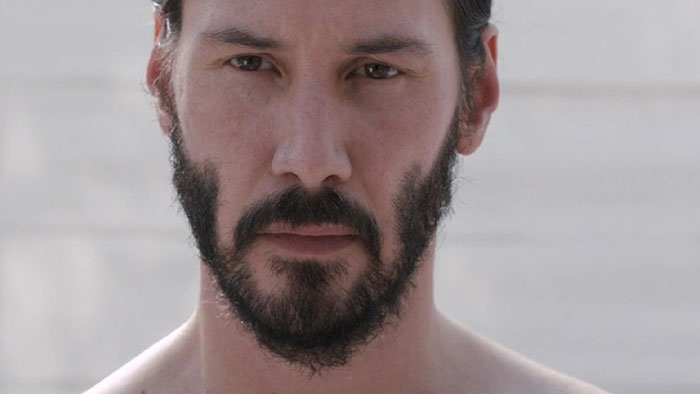 Keanu Reeves watching