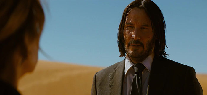 Keanu Reeves wearing suit