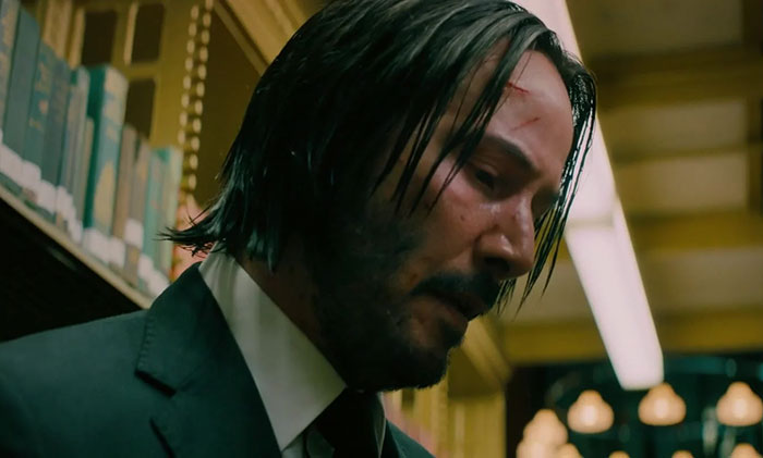 Keanu Reeves wearing suit