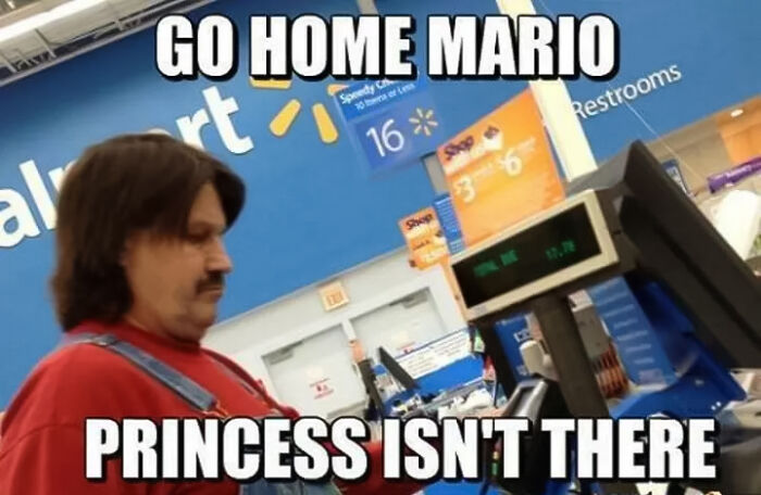 A man looking like Mario standing in supermarket at cashier
