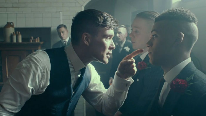 Tommy Shelby pointing a finger at Isiah Jesus