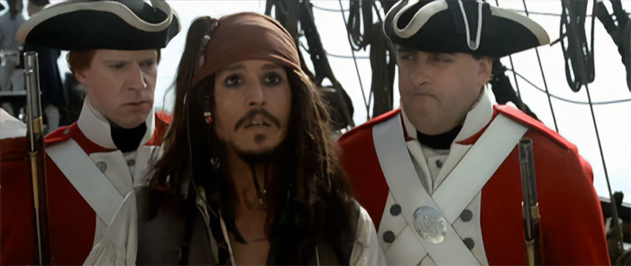 Jack Sparrow with 2 guards on deck