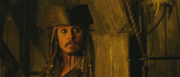 Jack Sparrow carefully looking at someone 