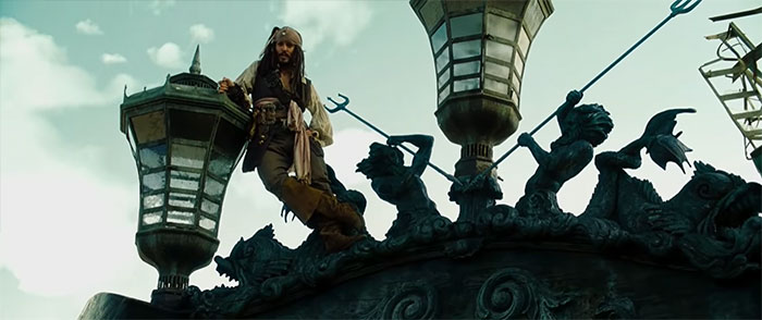 Jack Sparrow leaning on a big lamp on a ship 