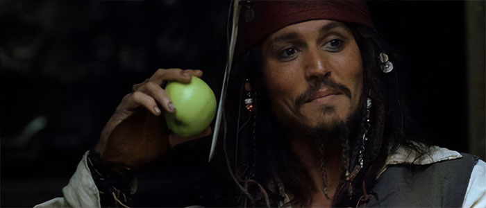 Jack Sparrow holding green apple