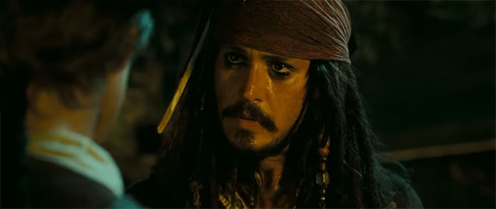 Jack Sparrow talking to someone seriously