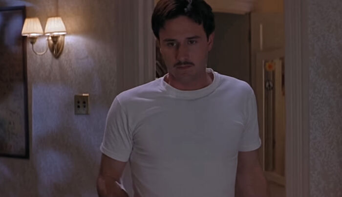 Dewey looking at someone in the room 