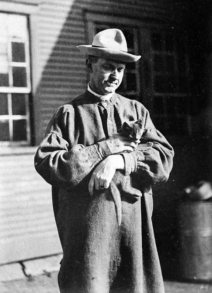 United States President Calvin Coolidge Holding A Kitty At His Family Farm In Plymouth Notch, Vermont, 1924