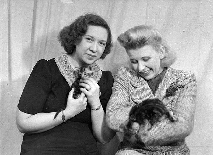 Two Actresses, Each Holding A Small Kitten. A Scene From "These Children"