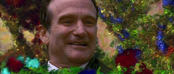 Robin williams surrounded by flowers in what dreams may come
