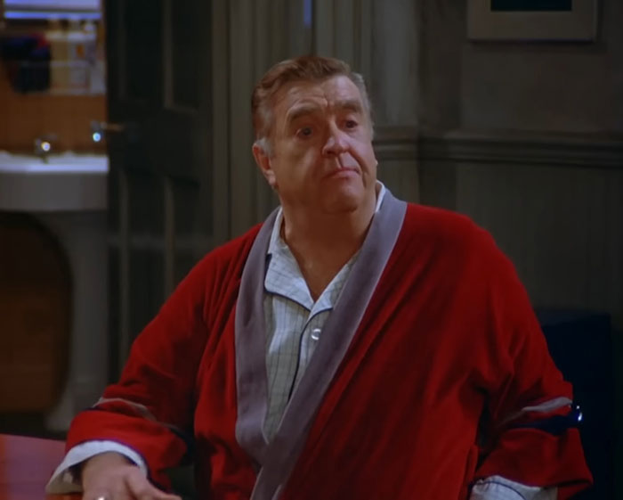 Morty Seinfeld wearing red robe
