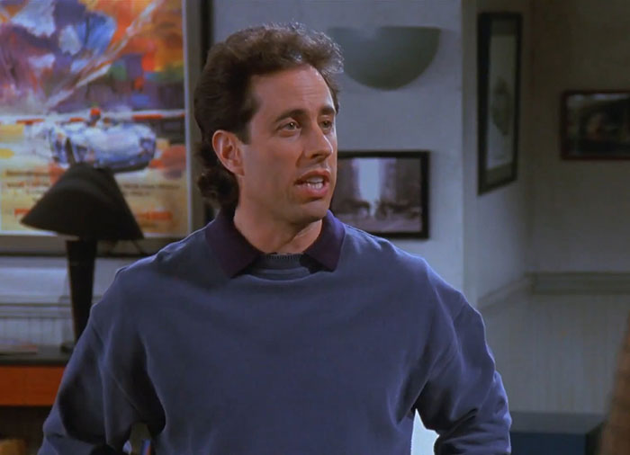 Jerry wearing blue sweater