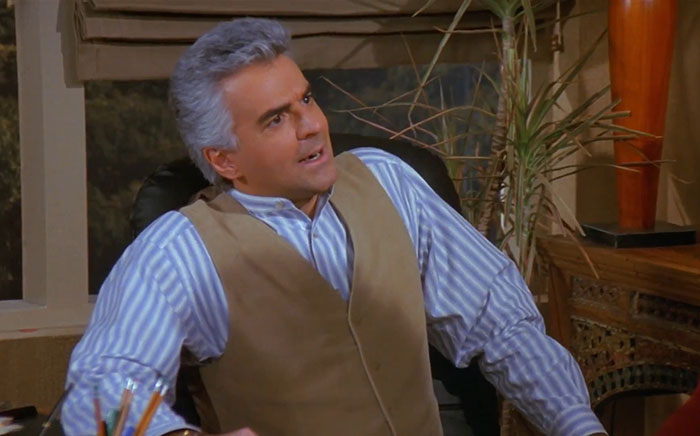 J. Peterman wearing brown and blue clothes