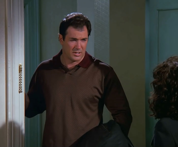 David Puddy from Seinfeld wearing a brown sweater, capturing one of the funniest Seinfeld quotes about everyday life.