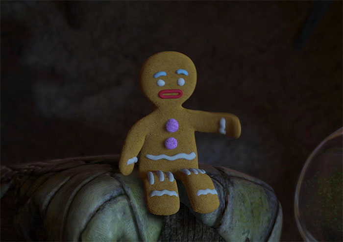 Gingerbread Man watching tv