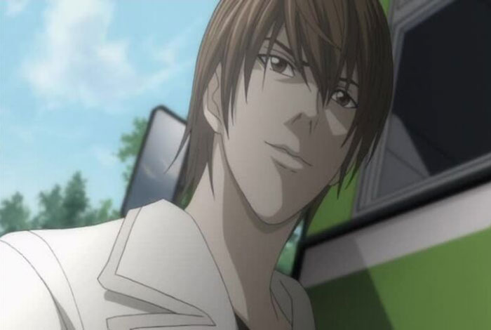 Light Yagami looking and eating from Death Note