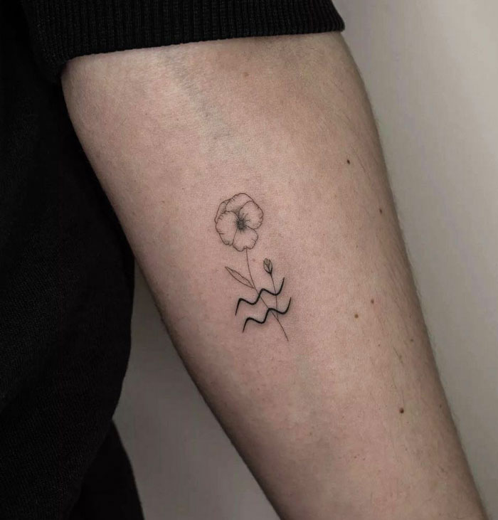 Birth flower and Aquarius zodiac sign arm tattoo